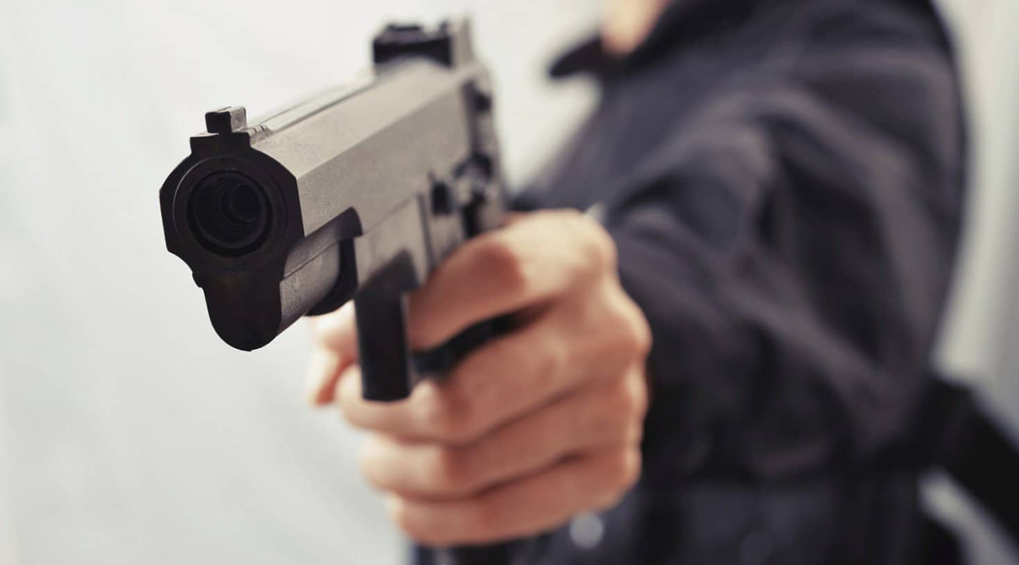 police hold gun police hold gun