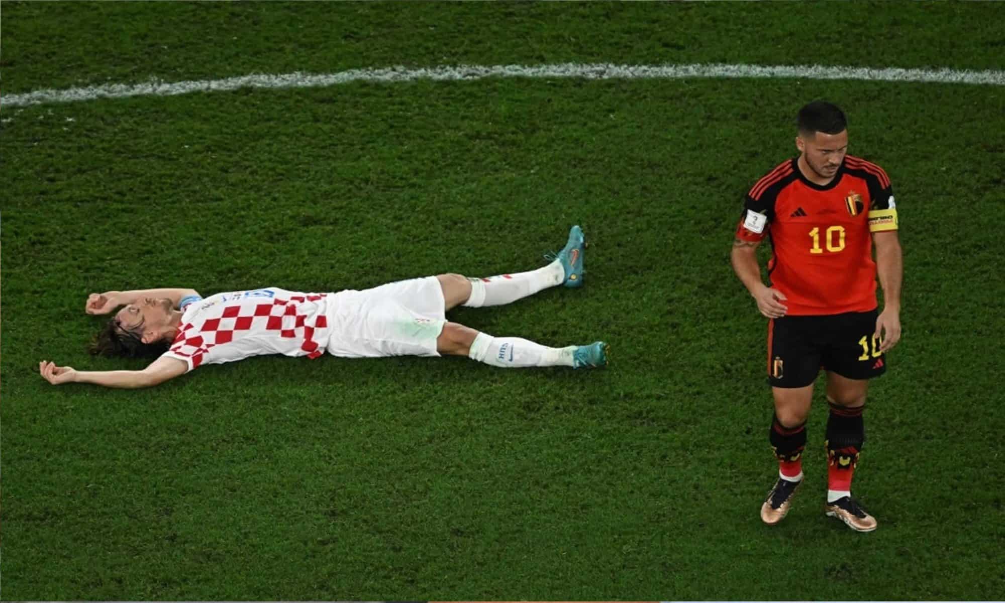 04 A EXAUSTÃO DE MODRIC DEPOIS DO EMPATE COM A BÉLGICA NA FASE DE GRUPOS. FOTO: AFP