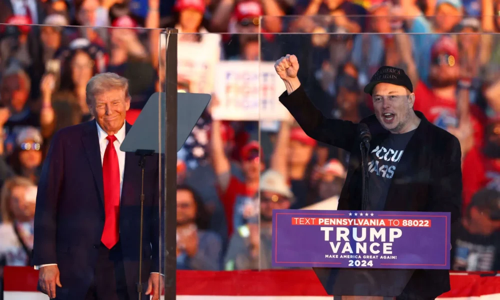 2024-10-16T112528Z_1_LYNXMPEK9F0EQ_RTROPTP_4_USA-ELECTION-TRUMP Elon Musk e Donald Trump em Butler, na Pensilvânia - 5/10/2024 (Foto: Carlos Barria/Reuters)