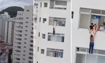 Uma mulher quase caiu de um prédio no litoral de São Paulo, nessa terça-feira (15), enquanto limpava as janelas de um apartamento. O vídeo viralizou nas redes sociais • Reprodução