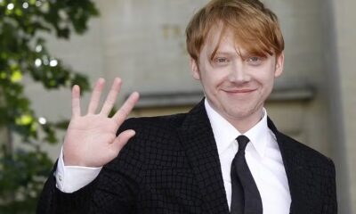 Rupert Grint acena para as câmeras — Foto: Reuters