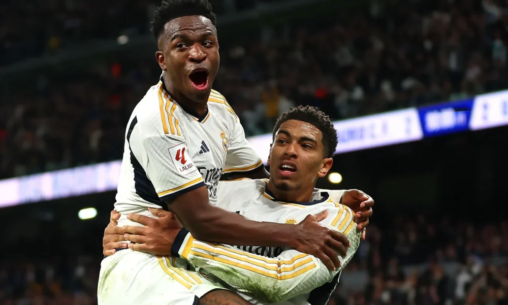 vinicius-junior-real-madrid-bellingham-e1720789509528 Vini Jr e Bellingham comemoram gol do Real Madrid • Florencia Tan Jun/Getty Images