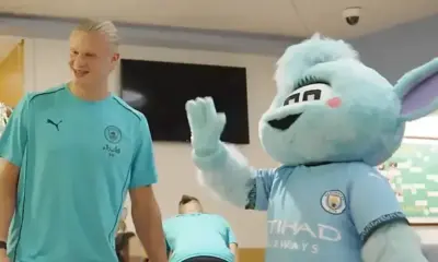 erling-haaland-manchester-city-moonbeam-mascote-e1743259389908 Erling Haaland e a mascote do clube, Moonbeam • Reprodução/Manchester City