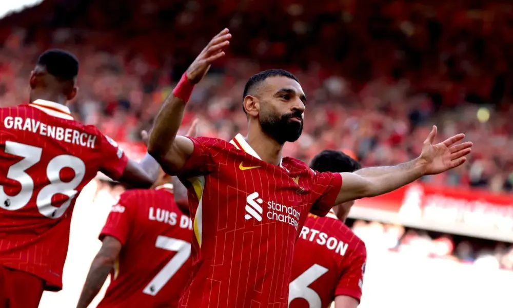 mohames-salah-liverpool-tottenham-premier-league-e1745774521349 Salah comemora gol na vitória sobre o Tottenham, em Anfield • Liverpool FC/Liverpool FC via Getty Images